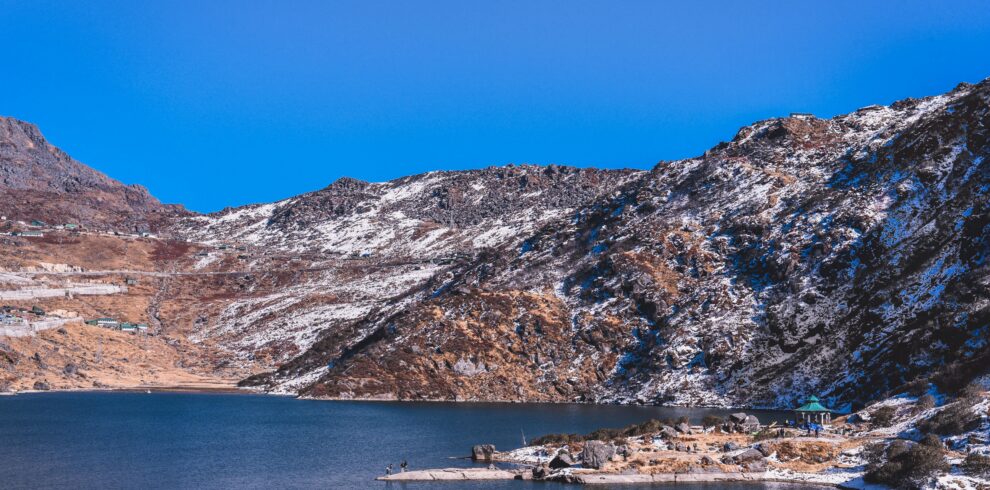Scenic view of snow-covered mountains and lake in Gangtok, India. Perfect for nature lovers.